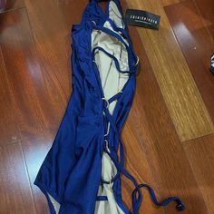 Sexy Strappy Blue One Piece Swimsuit Fashion Nova Nwt Size Medium Lace Up Size $30 Blue One-piece Lined Bodysuit, Blue Lined One-piece Bodysuit, Blue Halter Neck Bodysuit For Poolside, Blue Halter Neck Bodysuit For Beach Season, Chic Blue Backless Swimwear, Royal Blue Swimwear For Summer Party, Blue Halter Neck Bodysuit For Party, Chic Blue Swimming Bodysuit, Chic Blue Bodysuit For Poolside