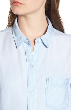 Lightweight and drapey, this wardrobe-essential chambray shirt is ideal for warmer temps-just roll up the sleeves and tuck the front into your favorite leg-flaunting bottoms for a casual-cool look. Style Name:Rails Ingrid Chambray Shirt. Style Number: 5632002. Available in stores. Relaxed Fit Tencel Tops For Casual Gatherings, Spring Shirt With Relaxed Fit And Shirttail Hem, Relaxed Fit Shirt With Shirttail Hem For Spring, Summer Everyday Light Wash Blouse, Relaxed Spring Blouse With Shirttail Hem, Light Wash Relaxed Fit Tops For Daywear, Relaxed Fit Light Wash Tops For Daywear, Effortless Summer Shirt For Casual Gatherings, Chic Everyday Blouse With Roll-up Sleeves