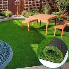 artificial grass is laid out on the lawn in front of a wooden table and bench