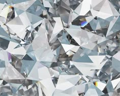 an image of many different shapes and sizes of diamond stones in white, grey and blue colors