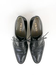 Perfect lace up leather oxford/ brogue shoes with slight point and 1 1/2” heel. No box. Made in ItalySize 7.5 (IT 38) women’sEra: 1990's 10 3/8”(inside) x 3 1/2”(outside) Condition: Good. Some visible wear (see photos). Designer Brogue Lace-up Shoes For Workwear, Designer Lace-up Shoes With Brogue Detailing For Work, Classic Oxford Shoes With Pointed Toe, Semi-formal Pointed Toe Oxfords With Branded Insole, Designer Wingtip Oxfords For Work, Designer Lace-up Oxfords For Work, Designer Wingtip Lace-up Shoes For Derby, Designer Lace-up Oxfords With Brogue Detailing, Designer Goodyear Welted Oxfords For Office