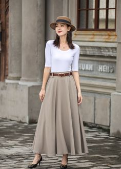 "Get dressed and out of the door in classic good looks with this pleated Long maxi skirt, crafted with soft cotton linen fabric, featuring pleated waist detail and two big pockets. DETAIL * More color https://etsy.me/3fsncV4 * 50% linen, 50% cotton * Has no lining, Not see through * Two pockets * High waistband * Back elastic waistband * Right Side zipper closure * Ankle length * Perfect for spring and summer, autumn * Wash by hand or machine with cold water *The model is 170 cm (5′7″) tall with Flowy Beige Maxi Skirt, Beige Pleated Cotton Maxi Skirt, Beige Cotton Pleated Maxi Skirt, Beige Relaxed Maxi Skirt, Relaxed Fit Beige Maxi Skirt, Beige Relaxed Fit Maxi Skirt, Beige Pleated Flared Maxi Skirt, Beige Maxi Length Lined Skirt, Beige Flared Maxi Skirt For Work