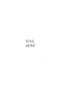 a black and white photo with the words kiss here