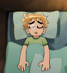 a boy laying in bed with his eyes closed