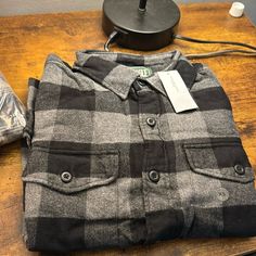 Extra Small, Black And Gray Plaid Flannel Long Sleeve, American Eagle Button Up Shirt Casual Black Flannel Outerwear, Black Casual Flannel Shirt With Pockets, Casual Black Flannel Shirt With Pockets, Black Collared Flannel Shirt For Winter, Black Winter Flannel Shirt With Pockets, Black Flannel Long Sleeve Outerwear, Black Long Sleeve Flannel Outerwear, Black Collared Flannel Shirt With Pockets, Black Flannel Shirt With Pockets For Winter