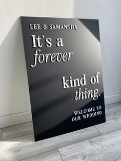 a sign that says it's a forever kind of thing welcomes us to our wedding