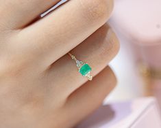 This product is a dainty ring.Using natural stone adds privilege to the product. It can be preferred for all special day or daily using. Emerald                   :      App.   0,55 ct Diamond                 :      App.   0.08 ct G/H VSI  Gram                       :      App.    1.13 GR Product Code        :      LR00060DE   All of our jewelry  is made from solid 14k yellow,white and rose gold.Because of using natural stone, the color of it may differ. All items in our store are 100 % handmade Ring Baguette, Minimal Ring, Zierlicher Ring, Sparkly Earrings, Solitaire Necklaces, Eternity Ring Diamond, Baguette Cut, Best Diamond, Lovely Jewellery