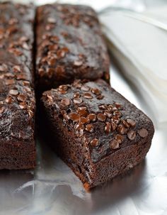 a close up of some brownies on a table