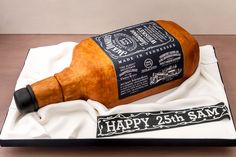 a birthday cake made to look like a bottle