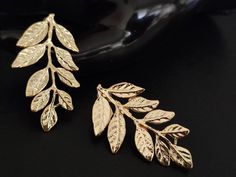 Unique handmade brass olive earrings gold plated, olive leaf earrings for women. Discover a large collection of ancient Greek jewelry in my store This item is a beautiful pair of gold plated olive leaf earrings from Ancient Greece. The Greek olive leaf is a powerful symbol in Greece. It symbolizes peace, victory, harmony and prosperity. An ideal gift for women who stand out with their style **How to care for your jewelry: ○ Remove your jewelry when swimming, sunbathing and showering ○ Keep them Athena Symbol, Olive Earrings, Accessories Png, Ancient Greek Jewelry, Goddess Athena, Ancient Greek Art, Body Creams, Athena Goddess, Greek Jewelry