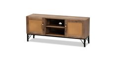 an entertainment unit with wicker doors and black legs