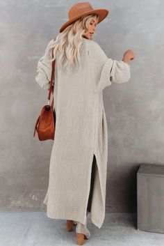 Chic Beige Ribbed Outerwear, Beige Ribbed V-neck Outerwear, Long Ribbed Sweater For Fall, Long Ribbed Winter Sweater, Beige Winter Sweater Coat, Long Ribbed Sweater For Winter, Beige Solid Color Sweater Coat For Winter, Long Ribbed Knit Sweater, Long Beige Knit Outerwear