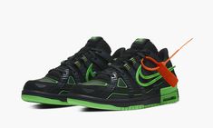 The Off-White x Nike Air Rubber Dunk “Green Strike” is a silhouette created by Virgil Abloh and Nike that siphons inspiration from the Nike SB Dunk and P-6000. A Fall 2020 release, the Air Rubber Dunk is a new-age take on the venerable Dunk model that incorporates elements of Nike’s performance heritage. The upper is reminiscent of the Dunk in shape, and adds multiple layers and textures courtesy of the P-6000. Vertical black leather overlays can be found across the tonal mesh base. A large gree Dunk Green, Doudoune The North Face, P 6000, Off White X Nike, Baskets Nike, Nike Sb Dunks, Virgil Abloh, Black & White, Nike Sb