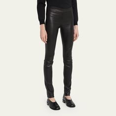 The Row moto stretch leather leggings Approx. measurements: 31" inseam, 40" outseam Natural rise; banded waist Skinny legs with seam detail Pull on style Lambskin bonded to cotton/spandex Dry clean Made in USA of imported material Black Cotton Leggings, Hem Leggings, Moto Leggings, Moto Style, Cotton Leggings, Modern Trend, Leather Leggings, Leggings Fashion, Leather Coat