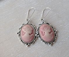 Pink Cameo Earrings Victorian earrings Vintage earrings Bow earrings Victorian Lady Cameo Jewelry Mothers day gift Bridesmaid  Woman Cameo This lovely yet rose cameo earrings are just divine. This lovely piece of jewelry measures to fit a 25x18 inch cameo and comes with great antique toned french hook style dangle earrings. These gorgeous earrings measure 1 3/4 inches in length and would be the perfect gift for you or someone special. Cameo jewelry: https://www.etsy.com/listing/500220724/pink-ca Vintage Cameo Jewelry, Cameo Bracelet, Victorian Earrings, Cameo Earrings, Mother Jewelry, Cameo Jewelry, Victorian Lady, Cameo Necklace, Bow Earrings