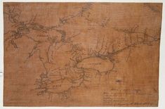 an old map is displayed on a piece of paper that has been drawn onto it