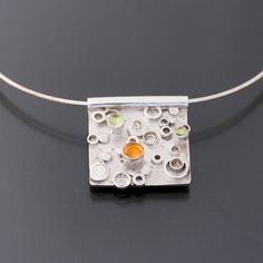 Modern Pendant Jewelry With Bezel Setting, White Gold Sterling Silver Necklace With Multi-stone, White Gold Sterling Silver Multi-stone Necklace, White Gold Multi-stone Sterling Silver Necklace, Modern Silver Gemstone Necklaces, Modern Silver Birthstone Necklace, Modern Silver Birthstone Necklaces, Modern Sterling Silver Jewelry With Bezel Setting, Modern Sterling Silver Necklace With Bezel Setting