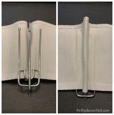 the zipper is closed and there are two pieces of fabric with metal hooks attached to it