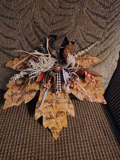 a close up of a decorative item on a couch