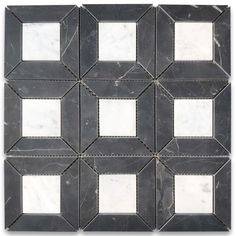 a black and white marble tile with squares