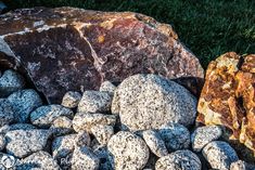 two large rocks sitting next to each other