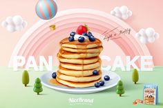 a stack of pancakes with blueberries and strawberries on top are in front of a pink background