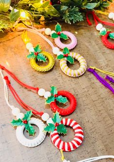 some christmas wreaths are on the table