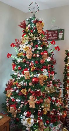 a christmas tree decorated with teddy bears and candy canes