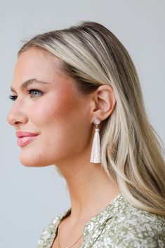 The Claudia Gold Tassel Earrings are the chic accessory you'll take with you wherever you go! These trendy earrings start with a stud post back and have a tassel detail. Add these fun earrings to a black dress + heels to add a chic touch to your date night look! Gold Plated Tassels Stud Post Back One Size | Length 2.75” Elegant Tassel Earrings For Party, Tassel Earrings For Wedding, Chic Evening Earrings With Tassels, Party Fringe Earrings, Chic Tassel Earrings For Evening, Chic Tassel Earrings For Party, Trendy Tassel Drop Earrings For Evening, Chic Dangle Tassel Earrings For Party, Chic Tassel Drop Earrings For Party