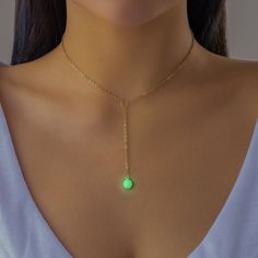 Description:Dainty Luminous Glow In The Dark Ball Charm Y NecklaceSpecification:Length: 11.8" + 2.7" extWeight: 0.09 oz/pcMaterial: copper. aluminous stoneColor: gold Features & Details:This luminous glow in the dark ball charm Y necklace is made of nickel-free. lead-free. cadmium-free and hypoallergenic materials. which will not turn your skin green or cause anaphylactic reaction.It is easy to match your different outfits and also suitable for any occasions like wedding. banquet. costume party. engaged party. prom. anniversary. holiday. evening party or other social events. where let you look elegant. attractive and fashionable.You can give it directly as a gift to your lover. wife. girlfriend. daughter. and your friends for valentine's day. christmas. anniversary. thanksgiving or birthda Luminous Green Jewelry For Party, Luminous Jewelry For Gift, Green Luminous Jewelry For Party, Green Dangle Lariat Necklace For Gift, Glow Necklace, Glowing Necklace Pendants, Glowing Moon Necklace, Glow In The Dark Crystal Necklace, Short Neck