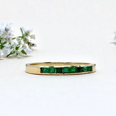 We Have One of a Kind Everyday Ring in 18K GOLD. Statement Ring in 18k Solid Gold For Women from our Capsule Jewelry Collection. NATURAL EMERALD Baguette Precious Gemstone Ring in 18kt SOLID YELLOW GOLD.  Emerald Baguette Stone is set in Bezel Setting in our Factory. Gold Ring. AAA+ Quality  Precious Gemstone Ring. Etsy Handmade Jewelry, Handmade Ring For Wedding Gift ( Stamped 750 /18k), Ring. Perfect Gift For Everyday or Gift for a November Birthstone Your Loved One. GIFT For Her  ► DIMENSIONS: ◆ Gemstone : Emerald                          ◆ Number of Gemstone : - 9 pcs                                              ◆ Stone size : 2*2 mm ◆ Stone Shape : Baguette ◆  Cut : Faceted  ◆ Gross Weight : 1.440 grams ◆ Stone Weight : 0.30 Ct 14k Gold Stackable Emerald-cut Rings For May Birthstone, 14k Gold Emerald-cut Stackable Rings For May Birthstone, Luxury Yellow Gold Half Eternity Emerald Ring, Heirloom Ring With Rectangular Stone For Gift, Heirloom Ring With Rectangular Stone As Gift, Heirloom Emerald Baguette Cut Ring, Yellow Gold Emerald-cut Emerald Stackable Rings, Luxury Emerald Rings With Rectangular Stone, Yellow Gold Baguette Cut Birthstone Ring Gift