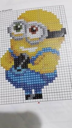 a cross - stitch pattern of a cartoon character from the movie despicaded