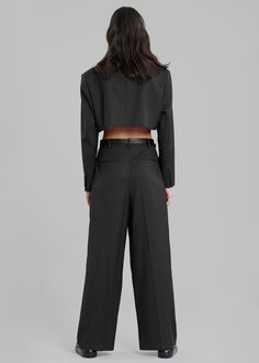 Color: BlackClassic woven suiting fabricRelaxed wide leg fitHigh riseBelt loopsFront pleat detailingTraveler's creaseSide seam pocketsIllusion welted back pocketsHook and bar closureZip flyUnlined70% Polyester 30% WoolDry CleanImported Tailored Wide Leg Pantsuit With Welt Pockets, Tailored Wide-leg Pantsuit With Welt Pockets, Semi-formal Wide Leg Pants With Pockets, Modern Formal Wide Leg Pants With Pockets, Tailored Wide-leg Pantsuit With Belt Loops, Wide-leg Business Casual Pantsuit With Belt Loops, Business Wide Leg Pants With Pockets, Black Straight Culottes For Formal Occasions, Formal High-waisted Culottes With Pockets