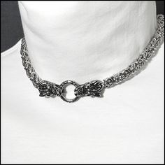 "The necklace features my original design Norse Mythology Fenrir wolf head ends on a premium-quality  8mm chainmaille necklace. Order and wear it collar or longer necklace length. It's a great look by itself or, create your own look by adding your own pendant, keepsake, ring, stone, art - or other \"stuff\". Order with or without a clasp behind the neck. The necklace comes with my signed certificate of authenticity, a deluxe gift box, and a velvet jewelry pouch. FEATURES - my original design ant Silver Gothic Box Chain Jewelry, Silver Gothic Jewelry For Costume, Gothic Stainless Steel Chainmail Jewelry, Medieval Silver Chainmail Jewelry, Gothic Chainmail Jewelry Gift, Gothic Engraved Jewelry For Larp, Snarling Wolf, Love Warriors, Head Chain