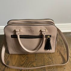 Used Kate Spade Bag With Minimal Signs Of Wear And Tear. It Has Three Pockets On Top, Two With Zippers And One With A Clip (Main Pocket). There Is Also A Side Pocket. It Has Hand Handles As Well As Shoulder Handle. It Is A Medium Size Bag Approximately The Size Of A Regular Shoe Box As Shown In The Picture Kate Spade Bag, Black Cream, Medium Size, Shoe Box, Kate Spade, Zipper, Bag Lady, Shoulder Bag, Women Shopping