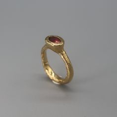 Pink Tourmaline set in gold-plated sterling silver ring. The ring in the photo is size FR 52, but it can be made to order as well, don't hesitate to write me for any custom order. here is an online ring size converter http://www.ringsizes.co/ If you don't know your ring size, check this method: https://www.instagram.com/p/CTmHVMkATEg/ here is an online ring size converter http://www.ringsizes.co/ To see more similar rings, follow this link: https://www.etsy.com/fr/shop/AtelierTiuh?section_id=32800820 Do not hesitate to check my shop on Instagram as well: https://www.instagram.com/atelier_tiuh/ Gold Ruby Ring With Bezel Setting, Open Ring, Gold Ruby Ring With Bezel Setting, Open Design, Gold Oval Tourmaline Ring, Gold Tourmaline Rings, Gold Tourmaline Gemstone Rings, Gold Tourmaline Jewelry With Bezel Setting, Unique Gold Ruby Rings, Gold Tourmaline Wedding Birthstone Ring, Gold Tourmaline Birthstone Promise Ring