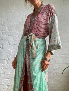 "This is patchwork style robe, with wrap tie closure feels very light and comfy as a daily cover up around the house or outside paired with jeans  Loose and silky, with wide kimono sleeves MEAESURE one size fits most  length 55\" MATERIAL *polyester Please visit also  https://www.etsy.com/shop/AltheaStores For more ideas Thank You for looking" Bohemian V-neck Robe For Loungewear, Bohemian V-neck Festival Robe, Bohemian Kimono With Tie Waist And Kimono Sleeves, Hippie Wrap Kimono For Beach Cover-up, Bohemian Wrap Robe For Festivals, Green Bohemian Wrap Kaftan, Patchwork Long Sleeve Kimono For The Beach, Green Wrap Kimono With Tie Waist, Long Sleeve Patchwork Kimono For The Beach