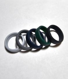 8mm Silicone rubber wedding ring / band. 8mm width with thicker band - ideal for men Available in size 7 to 14 Ideal ring for active lifestyles  As silicone is flexible and moulds to any shape - they can make an ideal ring for active lifestyle or someone who does a lot of work with there hand. Want to keep your normal wedding band safe when you workout or go swimming - but don't want to go out without a ring Worried about bending or catching your ring on machinery - no issues with a silicon ring Rubber Rings Wedding, Silicone Rings, Wolfram, Silicone Rubber, Wood Rings, Minerals And Gemstones, Men And Women, Wedding Ring Bands, That Way