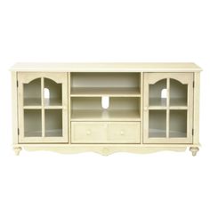 a white entertainment center with glass doors on the front and bottom shelves, in an antique style