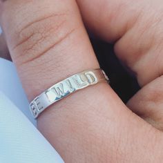 hand stamped sterling silver ring. Positive affirmation hand stamped silver rings to wear as a reminder. Six quote available; 🔸I Am Enough 🔸I Belong Here 🔸Trust Yourself 🔸Keep Going 🔸I Am The Magic 🔸Be Wild & Free Or personalise with what anything you want! 15 max characters but please feel free to get in touch if you would like more, as I'm happy to accommodate!  Made with 3.5mm wide and 1mm thick sterling silver. If you are unsure on a size please send me a message and I will be happy to help. If buying as a gift and unsure on their size I am happy to make the ring adjustable so let me know! Chose from one, two or more. ✨ Meaningful Silver Stackable Rings, Meaningful Stamped Engraved Promise Ring, Meaningful Sterling Silver Promise Ring Engraved, Meaningful Engraved Sterling Silver Promise Ring, Meaningful Hand Stamped Engraved Promise Ring, Silver Hand-stamped Engraved Ring, Everyday Meaningful Hand Stamped Stackable Rings, Meaningful Hand Stamped Promise Ring, Promise Rings With Hand Stamped Meaningful Style