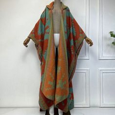 This super soft and warm wool cardigan kimono is perfect for the cold weather. Unlike other sweaters and wools, the wool used for this beauty is non itchy. Think of your favorite throw blanket, the comfort and warmth it gives but 10x stylish and wearable any where. This kimono is all that and more! One size fits S-4X Material: Wool One Size Fits Most Size Chart Wool Shawl Outerwear For Winter, Bohemian Shawl For Fall Layering, Cozy Long Sleeve Cape For Cold Weather, One Size Winter Acrylic Sweater Coat, Cozy Multicolor Winter Cape, One Size Acrylic Sweater Coat For Winter, Acrylic Poncho Shawl For Fall, Acrylic Shawl Poncho For Fall, Green Casual Shawl For Fall