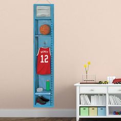 a blue locker with a basketball jersey hanging on it's wall next to a toy car