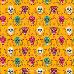 a yellow background with colorful skulls and flowers