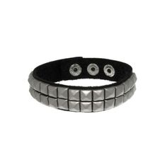 This bracelet is crafted of black genuine leather with two rows of brushed steel pyramid-style studs. The bracelet includes base metal snap closure for easy and comfortable wear. Crafted of steel, base metal, and black genuine leather Finish: Brushed Color: Black, silver Bracelet dimensions: 16.7 mm wide x 7.09-8.27 inches long; Clasp: Snap Complimentary gift box included Brushed Steel, Base Metal, Jewelry Trends, Anklets, The Row, Leather Bracelet, Silver Bracelet, Black Leather, Genuine Leather