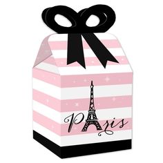 a pink and white box with the eiffel tower on it's side