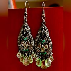 Beautiful Bohemian Drop Earrings, A Really Pretty Design Handmade From Vintage Indian Jewelry With Green Glass Crystals, Gems & Silver Plated, They Catch The Light Beautifully And Are Really Light. Green Is The Color Of Growth, Vitality, Renewal, Compassion, Nature, And Nurturing Stones. Smoke Free Home Fast Shipping Green Metal Chandelier Earrings, Bohemian Silver Crystal Earrings, Bohemian Metal Teardrop Earrings For Party, Bohemian Teardrop Metal Earrings For Party, Bohemian Nickel-free Crystal Earrings For Parties, Silver Bohemian Teardrop Earrings For Party, Vintage Indian Jewelry, Crystals Gems, Vintage Indian