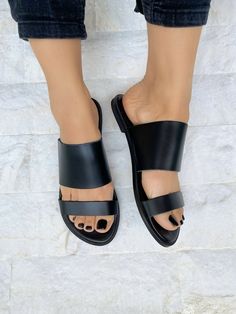 Step into timeless elegance with our Slip-On Leather Sandals, a perfect fusion of Greek-inspired design and modern comfort. Handcrafted with precision, each pair is meticulously crafted from 100% genuine leather, ensuring durability and quality that lasts. Embrace the charm of Greek-inspired fashion with these slip-on sandals, featuring a classic yet stylish design that complements any outfit. Whether you're strolling along the beach or exploring the city streets, these sandals are the perfect c Soft Leather Sandals, Leather Sandals Handmade, Comfy Sandals, Handmade Sandals, Leather Slide Sandals, Leather Sandals Women, Black Leather Sandals, Greek Sandals, Leather Slippers