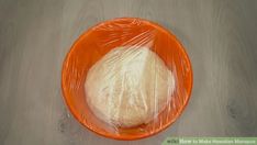 an orange plastic bag with some white stuff in it