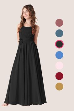 a woman in a long black dress with different colors