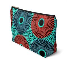 These t-bottom pouches now come in our retro color burst Ankara pattern print, and are great for pretty much anything. They make an fabulous, stylish grab and go bag; pencil case and cosmetic travel bag. Constructed of a durable material with a zipper closure. .: 100% Polyester .: Multiple sizes .: T-bottom 2.5 inches long .: With non-laminated lining Large Width, in 2.88 Length, in 12.29 Height, in 6.93 Travel Pencil Case Multicolor Rectangular, Multicolor Travel Zipper Pouch, Multicolor Zipper Pouch For Travel, Multicolor Zipper Pouch Pencil Case For Travel, Travel Multicolor Zipper Pouch Pencil Case, Multicolor Pouch Cosmetic Bag, Multicolor Travel Cosmetic Pouch, Multicolor Zipper Pouch Cosmetic Bag, Multicolor Clutch Cosmetic Bag For Travel